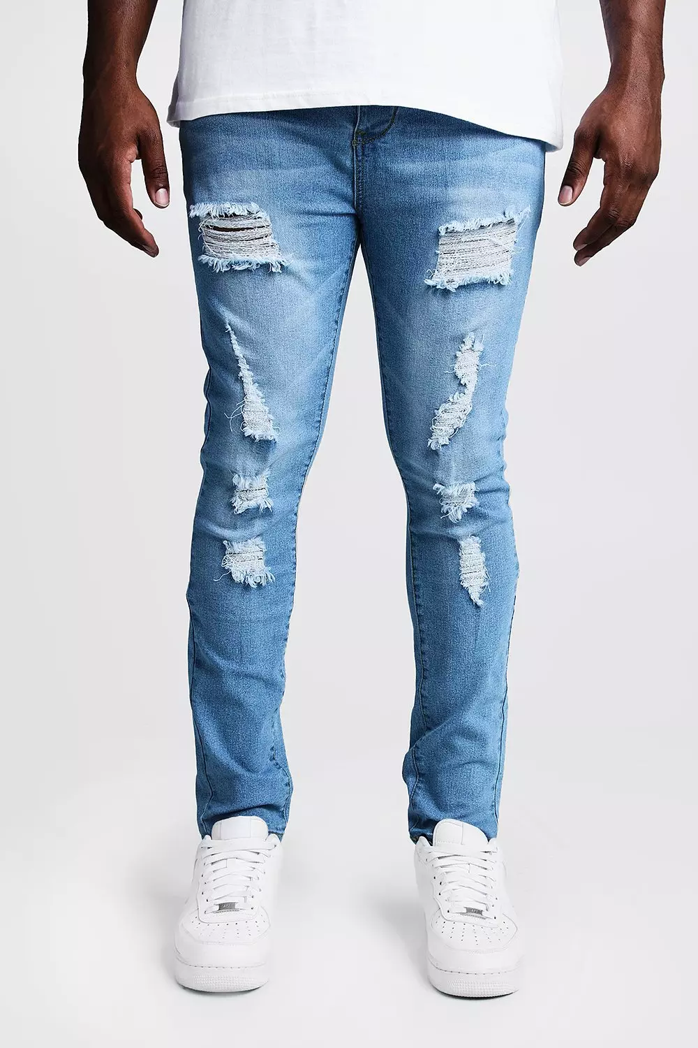 Skinny jeans best sale with big rips